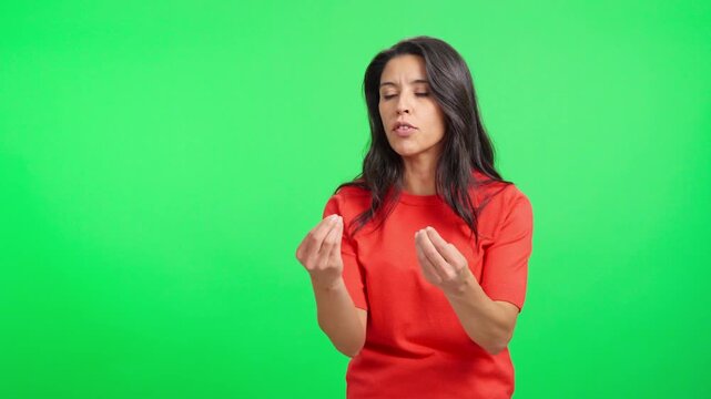 Angry hispanic woman arguing and complaining on green screen