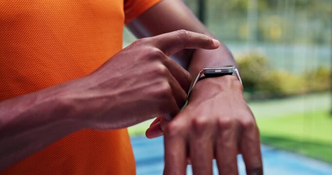 Hands, smart watch and click at tennis court for fitness routine, stats and check heart rate at park. Person, iot and application with clock, training break and monitor for exercise at club in summer - Powered by Adobe