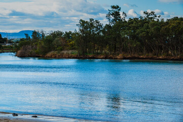  A serene coastal lagoon between Wollongong and Shellharbour, perfect for kayaking, fishing, birdwatching, and sunset walks — where nature, sky, and sea meet in harmony.