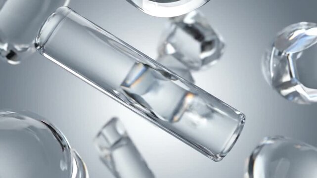 Floating, translucent, multifaceted shapes and clear glass objects against a soft, gradient background