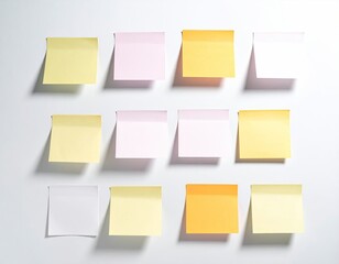 Fototapeta premium Sticky notes arranged on a white surface (1)