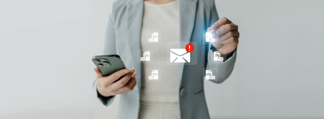 Person checking email notifications on smartphone, business emailing concept, notifications on...
