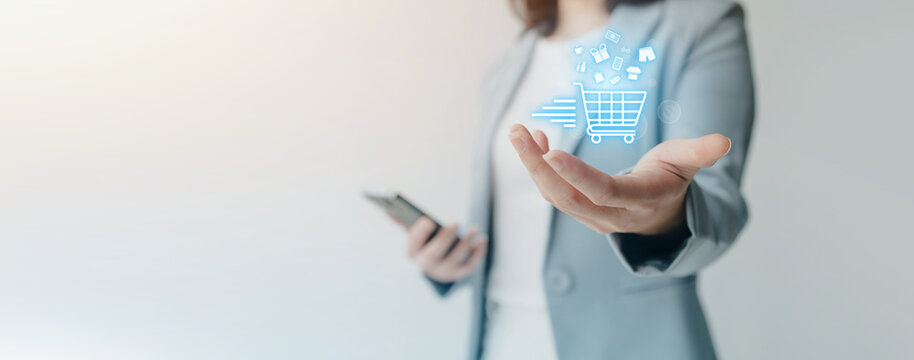 Online shopping and credit card payment concept, person is shopping on an online shopping website, purchasing goods and services securely, debiting credit card to pay for goods on the internet.