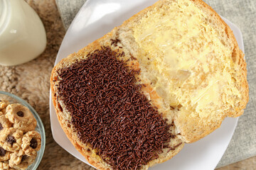 Bread with chocolate choco rice and butter with milk and snack for breakfast	

