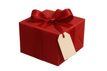 Obraz premium Red gift box with ribbon and blank tag, celebrating a special occasion, isolated on transparent background