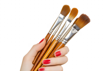 Hand holding art brushes isolated on a transparent background