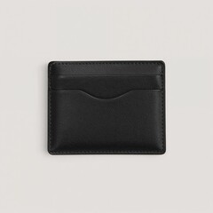 Black leather cardholder on neutral background  