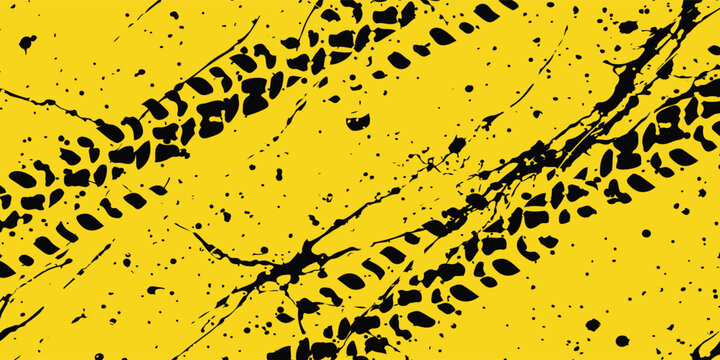 Abstract grunge background with black tire tracks and mud splatters on a vibrant yellow surface.