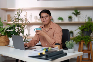 Remote Work Professional Enjoying Coffee at Home Office