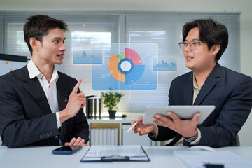 Two businessmen discussing business growth using tablet and document , perfect for a business...