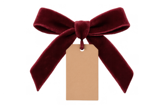 Velvet bow in deep red color with blank tag, attaching on gift, present, celebration, or sale item