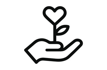 Obraz premium A loving hand gently cradles a growing heart shaped plant