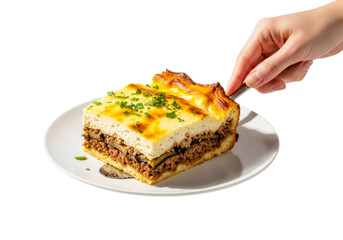 A slice of delicious moussaka isolated on transparent background being served