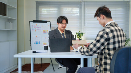 Application, hands and interview with business people in human resources office for hiring or recruitment. CV, documents or resume with manager and candidate talking in office for job opportunity