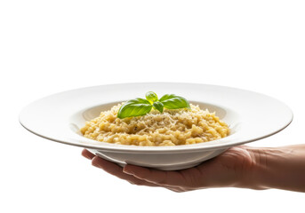 Hand holding a plate of risotto isolated on transparent background
