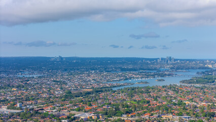 Panorama aerial drone view of western Sydney Suburbs of Canterbury Burwood Ashfield Marrickville Campsie with Houses roads and parks in Sydney New South Wales NSW Australia