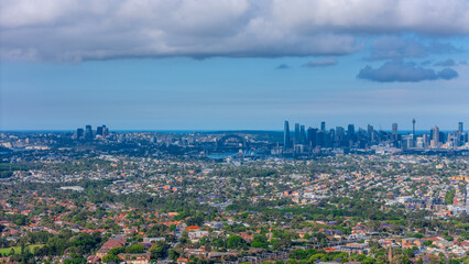 Panorama aerial drone view of western Sydney Suburbs of Canterbury Burwood Ashfield Marrickville Campsie with Houses roads and parks in Sydney New South Wales NSW Australia
