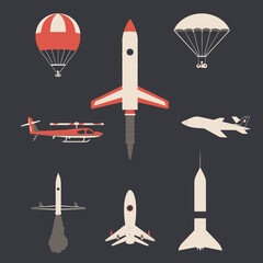 Flat design vector set of various flying objects: rockets, hot air balloon, helicopter, jet aircraft, and parachute. Air & space travel concepts.
