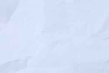 Obraz premium A dramatic collection of crumpled paper sheets in monochrome, highlighting the stark interplay of deep shadows, bright highlights, and intricate abstract textures.