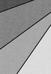 Black and white abstract geometric plaster background on coarse-grained wall - image with copy space