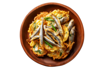 Whitebait Fritters small fish mixed with egg and fried like pancakes on wooden plate, isolated on white transparent background. Concept of New Zealand cuisine