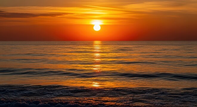 Golden sunset over serene ocean waves with vibrant horizon - Powered by Adobe