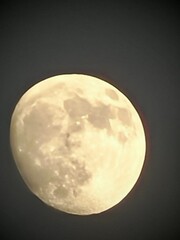 full moon over blue sky