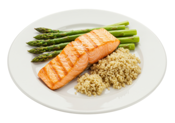 Isolated dinner plate with grilled salmon, asparagus, and quinoa for healthy meal