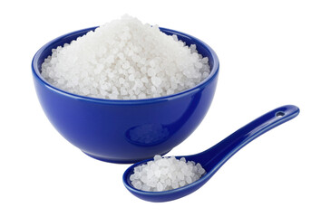 Isolated coarse salt in a blue bowl and spoon with white grains, a culinary flavor enhancer