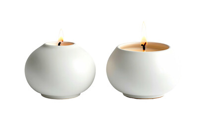 Two round white candles with lit flames against a dark background