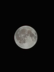 full moon over blue sky