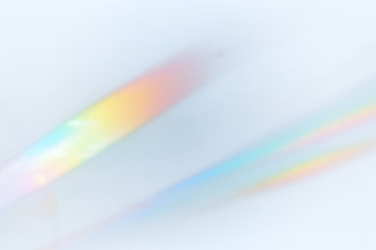 Crystal rays shimmer with rainbow reflections over transparent layers. Lens flare adds motion and luminous depth. Ideal for abstract or festive illustrations. PNG