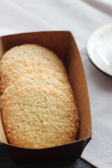 Sesame cookies in a box on the table