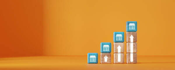 Stacked wooden blocks with store and arrow icons on orange background. Concept of business growth,...