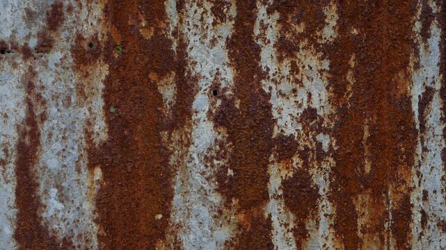 Heavily Rusted Corrugated Metal Sheet with Vertical Rust Streaks and Corrosion Patterns