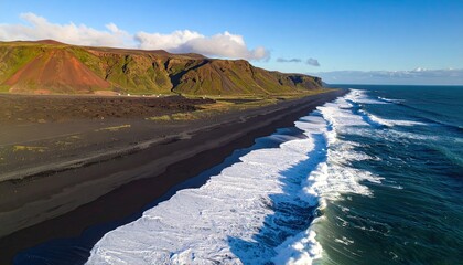 Aerial View of Volcanic Black Sand Beach with Ocean Waves