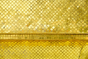 Shimmering Gold Mosaic Background with Reflective Textures and Patterns