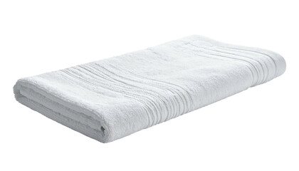 Folded, textured white cotton towel on a dark background