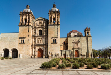 Front of the Church of Santo Domingo in Oaxaca, view from below, garden in the foreground