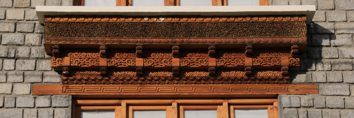 Traditional ornated timber lintel in Leh, India.