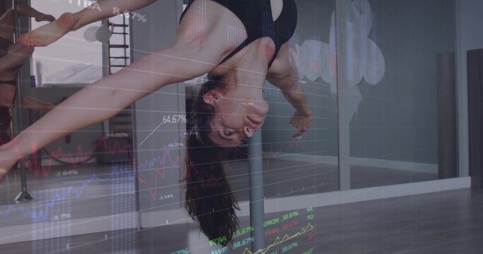 Performing dancer in black sportswear executing inverted pole in dance studio, with chart overlays - Powered by Adobe