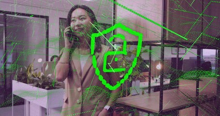Talking woman in blazer speaking on smartphone in open plan office, smartwatch and network overlay