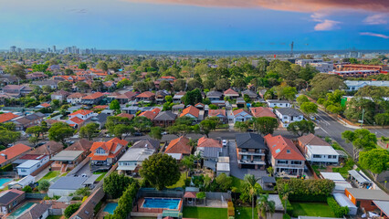 Panorama Sunset  aerial drone view of western Sydney Suburbs of Canterbury Burwood Ashfield...
