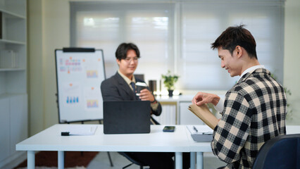 Application, hands and interview with business people in human resources office for hiring or recruitment. CV, documents or resume with manager and candidate talking in office for job opportunity