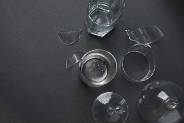 Fragments of broken glass on a black background
