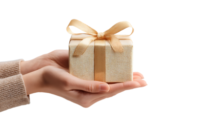 Hands holding a small, beautifully wrapped gift box with a golden ribbon, isolated on transparent background