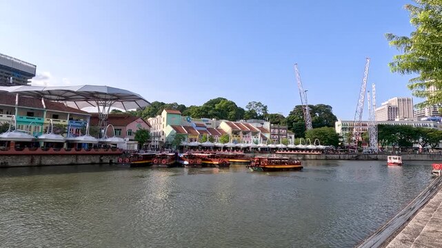 Daytime Riverside Walk Along Clarke Quay Waterfront in Singapore