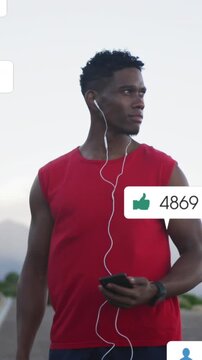 Animation of notification bars over african american athlete standing and listening to music