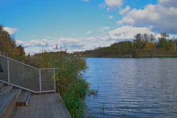 Contemporary Multi-Story Apartment Building with Glass and Metal Balconies