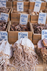 Various dried seafood for sale at market stall in Bangkok, Thailand